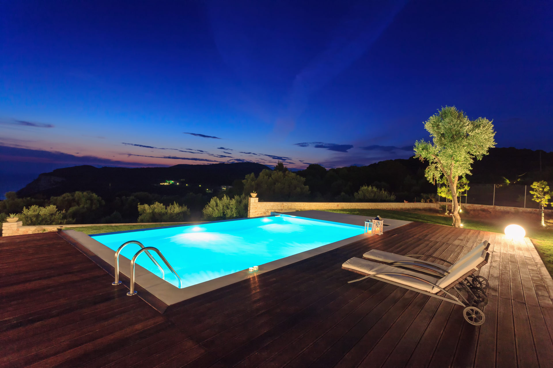 big  pool and luxury villa in the afternoon